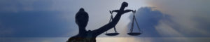 background image for district attorney page showing justice statue